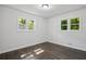Neutral bedroom with wood floors and an abundance of natural light at 2595 Elkhorn Dr, Decatur, GA 30034