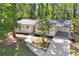 Charming home with a modern front door, covered carport, and fresh landscaping at 2595 Elkhorn Dr, Decatur, GA 30034