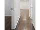 Hallway featuring beautiful hardwood flooring and neutral wall color at 2595 Elkhorn Dr, Decatur, GA 30034