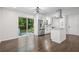 Bright kitchen featuring stainless steel appliances, a functional island, and sliding glass doors to the patio at 2595 Elkhorn Dr, Decatur, GA 30034