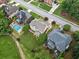 A planned neighborhood boasts mature trees, well-maintained lawns, and a fenced swimming pool at 580 River Valley Dr, Dacula, GA 30019