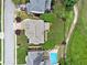 This suburban backyard showcases manicured lawns, mature trees, and a private swimming pool at 580 River Valley Dr, Dacula, GA 30019