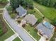 Lovely aerial view showcasing well-maintained lawns, landscaping, and a quiet neighborhood street at 580 River Valley Dr, Dacula, GA 30019