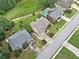 A vibrant neighborhood features manicured lawns, mature trees, and a refreshing swimming pool at 580 River Valley Dr, Dacula, GA 30019