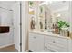 Bright bathroom features a glass shower, white vanity, and neutral decor at 580 River Valley Dr, Dacula, GA 30019