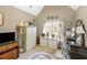 Comfortable bedroom with vaulted ceiling, desk area, and natural light at 580 River Valley Dr, Dacula, GA 30019