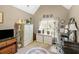 Bedroom featuring a desk, wardrobe, and natural light from the window at 580 River Valley Dr, Dacula, GA 30019