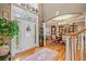 Elegant foyer featuring a decorative front door with sidelights and view of dining room at 580 River Valley Dr, Dacula, GA 30019