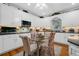 Charming eat-in kitchen with granite countertops, and lots of white cabinetry at 580 River Valley Dr, Dacula, GA 30019