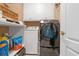 Functional laundry room featuring modern appliances and ample storage at 580 River Valley Dr, Dacula, GA 30019