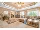 Spacious living room with a lounge area and natural light at 580 River Valley Dr, Dacula, GA 30019