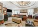 Spacious main bedroom features a fireplace, accent chair, and plush furniture at 580 River Valley Dr, Dacula, GA 30019