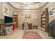 Cozy home office with custom ceiling, bookshelves, a comfortable desk, and carpet, perfect for productivity at 580 River Valley Dr, Dacula, GA 30019