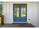 Striking blue double front door with glass panels and white trim, inviting natural light into the home at 2477 Bobbie Dr, Marietta, GA 30066