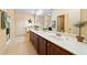 Bathroom with double sink vanity and large mirror, enhanced by a separate shower and tiled flooring at 221 Creekside Pass Pass, Canton, GA 30114