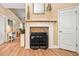 Cozy fireplace featuring stone accents and a decorative mantle at 221 Creekside Pass Pass, Canton, GA 30114