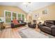 Comfortable living room featuring leather recliners and a relaxing atmosphere at 221 Creekside Pass Pass, Canton, GA 30114