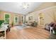 Spacious living room with vaulted ceilings, laminate floors, and an open layout at 221 Creekside Pass Pass, Canton, GA 30114