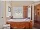 Bathroom features a luxurious soaking tub and a separate shower with decorative glass at 2909 Everson Ridge Ct, Snellville, GA 30039