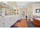 Bathroom featuring a large double sink vanity and soaking tub at 2909 Everson Ridge Ct, Snellville, GA 30039