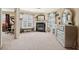Spacious bedroom with fireplace, dresser, and large window at 2909 Everson Ridge Ct, Snellville, GA 30039