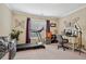 Bedroom with a treadmill, butterfly decorations, window with blinds, and a makeup vanity at 2909 Everson Ridge Ct, Snellville, GA 30039