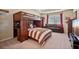 Bedroom showcasing a built-in bunk bed, cozy couch, and ample natural light from a large window at 2909 Everson Ridge Ct, Snellville, GA 30039