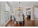 Bright breakfast nook with a table and chairs next to a window and access to other rooms at 2909 Everson Ridge Ct, Snellville, GA 30039