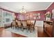 Elegant dining room with a large window, chandelier, and stylish decor at 2909 Everson Ridge Ct, Snellville, GA 30039