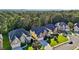 Well-manicured lawns highlight the exterior of these two-story homes with brick and siding accents at 2909 Everson Ridge Ct, Snellville, GA 30039