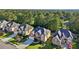 Well-manicured lawns highlight the exterior of these two-story homes with brick and siding accents at 2909 Everson Ridge Ct, Snellville, GA 30039