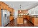 Spacious kitchen with stainless steel appliances, granite countertops and wood cabinets at 2909 Everson Ridge Ct, Snellville, GA 30039