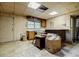 Spacious basement area with an unfinished ceiling, partial kitchen, and ample space at 3294 Francine Dr, Decatur, GA 30033