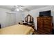 Comfortable bedroom with wood floors and closet with easy access to bedroom at 3294 Francine Dr, Decatur, GA 30033
