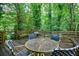 The deck offers a view of the private backyard with mature trees, perfect for outdoor enjoyment at 3294 Francine Dr, Decatur, GA 30033