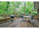 Relax on the deck with wooded views, ideal for peaceful outdoor living and entertaining guests at 3294 Francine Dr, Decatur, GA 30033