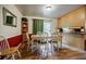 Casual dining area with wood floors, stylish chairs, and backyard access at 3294 Francine Dr, Decatur, GA 30033