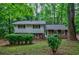 Quaint two-story home with traditional architecture and manicured front yard at 3294 Francine Dr, Decatur, GA 30033