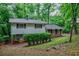 Charming split-level home with lush greenery and well-maintained landscaping at 3294 Francine Dr, Decatur, GA 30033