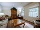 Bright living room with hardwood floors, large windows, and neutral decor at 3294 Francine Dr, Decatur, GA 30033