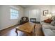 Cozy living room featuring hardwood floors and a view into the foyer at 3294 Francine Dr, Decatur, GA 30033