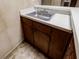 Features a sink with cabinet and a white countertop, offering functionality in a compact design at 3294 Francine Dr, Decatur, GA 30033