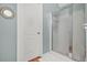 Bathroom with a glass door shower and a framed mirror at 60 Heaton Dr, Covington, GA 30016