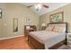 Cozy bedroom with vaulted ceiling and hardwood floors at 60 Heaton Dr, Covington, GA 30016