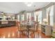 Cozy dining area with hardwood floors, a round table, and plenty of natural light at 60 Heaton Dr, Covington, GA 30016