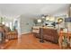 Spacious living room features wood floors and comfortable seating, perfect for entertaining guests at 60 Heaton Dr, Covington, GA 30016