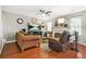 Relaxing living room with a fireplace, TV, and comfortable seating for Gathering time at 60 Heaton Dr, Covington, GA 30016