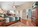 Spacious main bedroom boasts wood floors, vaulted ceilings, and ensuite bathroom at 60 Heaton Dr, Covington, GA 30016