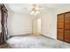 Bedroom with a large closet and an attached bathroom at 8464 Pleasant Hill Rd, Lithonia, GA 30058