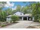 Beautiful home with an attached garage and a long drive at 8464 Pleasant Hill Rd, Lithonia, GA 30058